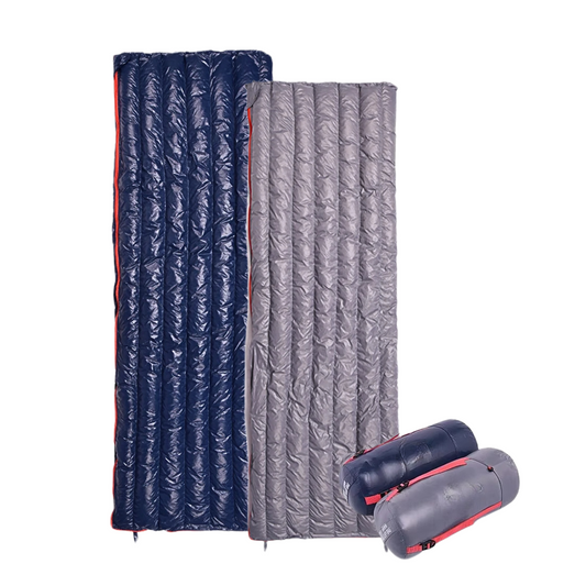 Down sleeping bag in navy blue and gray with compression sack