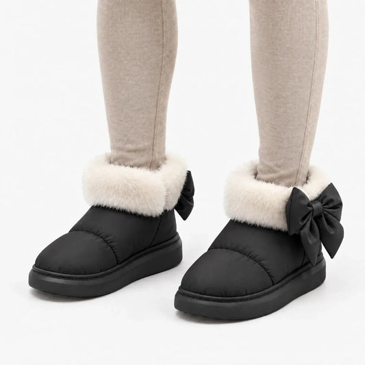 Women's winter boots in Black - product photo on white
