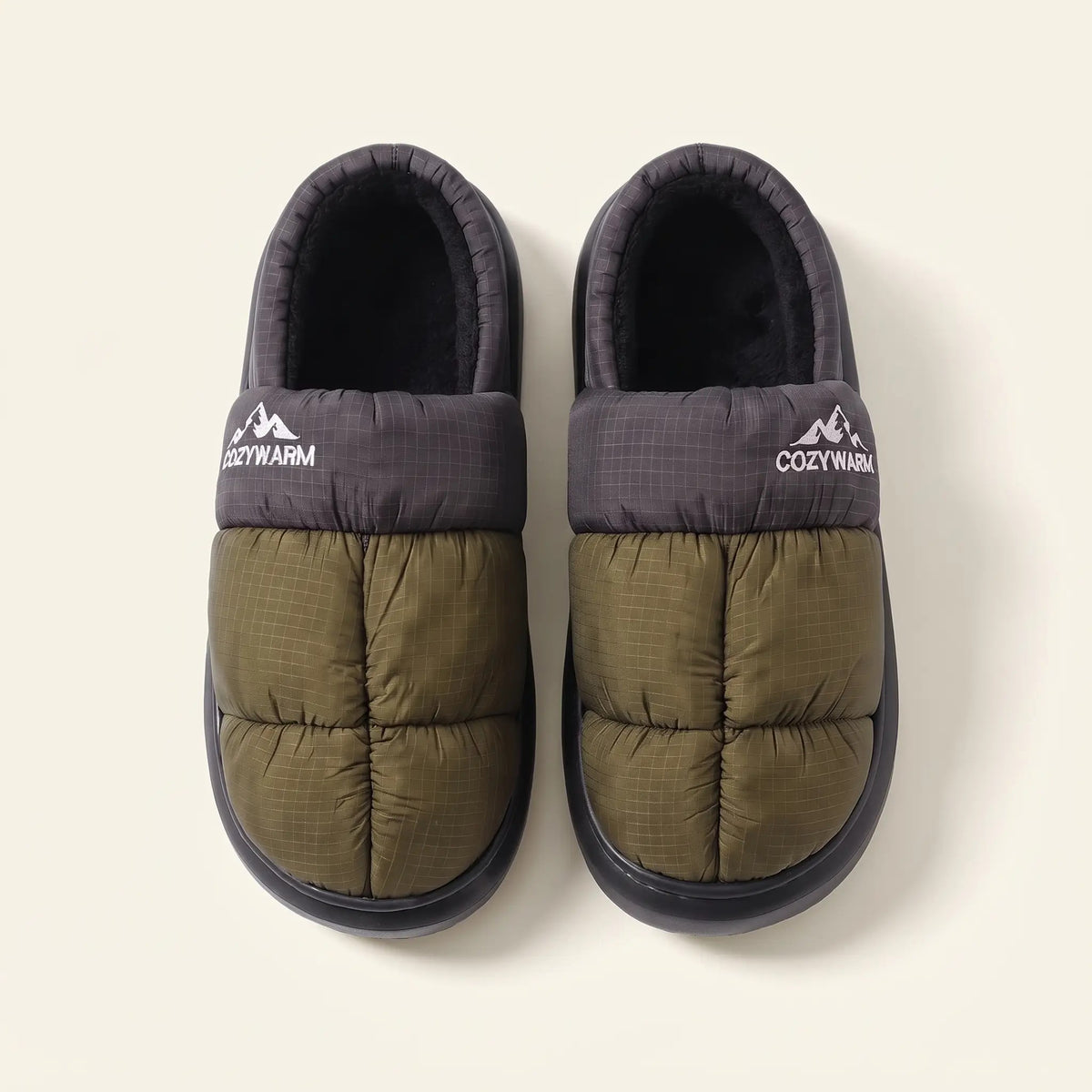 Closed-back camp slippers in Black/Green, top view: olive quilted upper, black collar and fleece lining