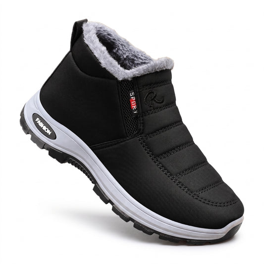 Plush lined winter boots in black, slip on ankle boot on a white background
