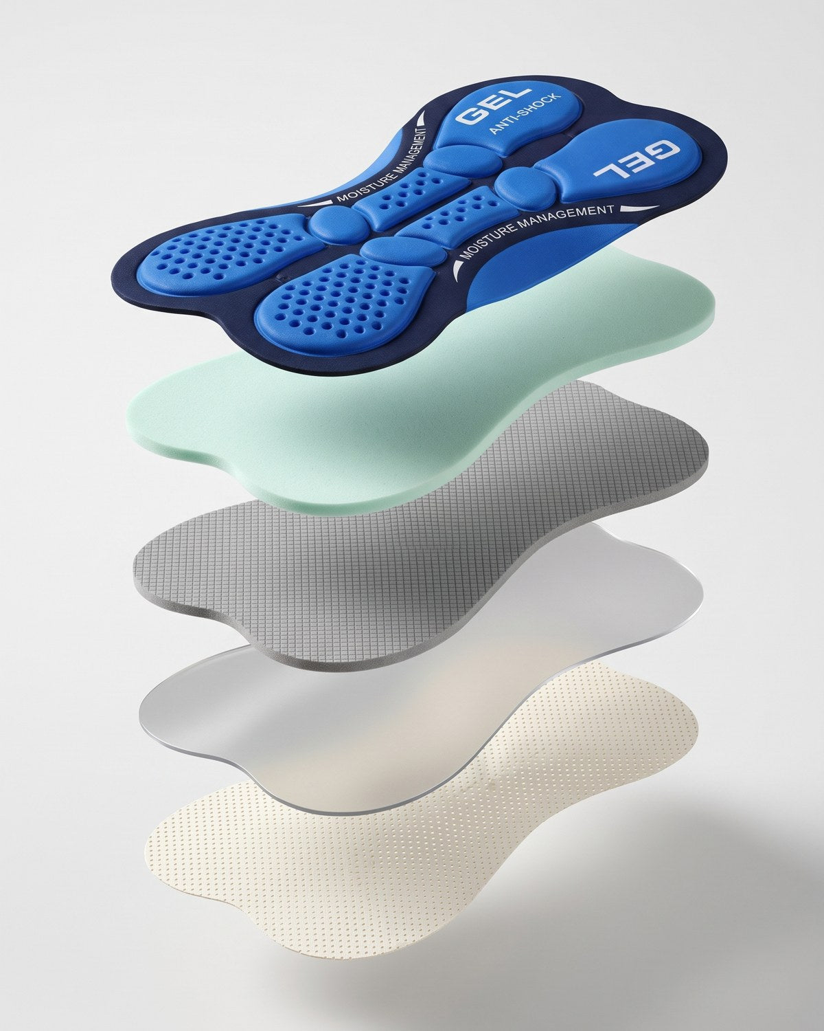 Five layers, one job: gel, sponge, dense foam, silicone and mesh between you and the saddle.